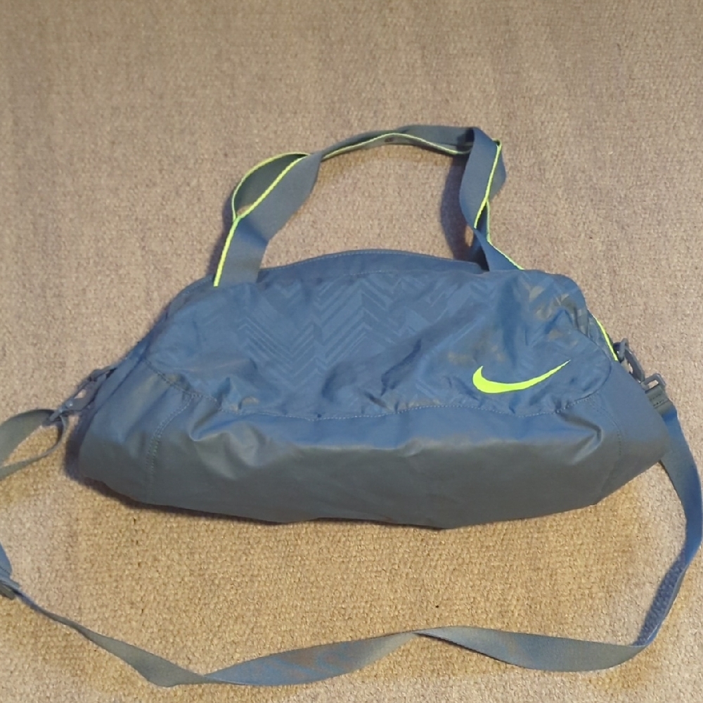 Nike C72 Legend 2.0 sport duffel bag in blue with neon green accents. 
